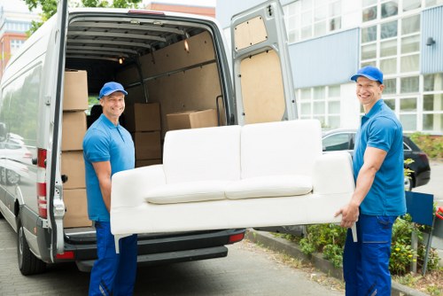 Professional packers handling household items in Hammersmith
