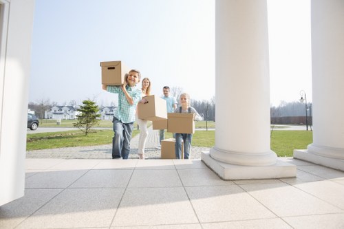 Professionals handling furniture pick-up in Hammersmith