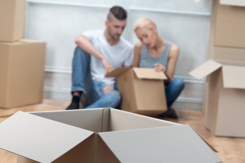 Professional movers handling furniture in a moving truck